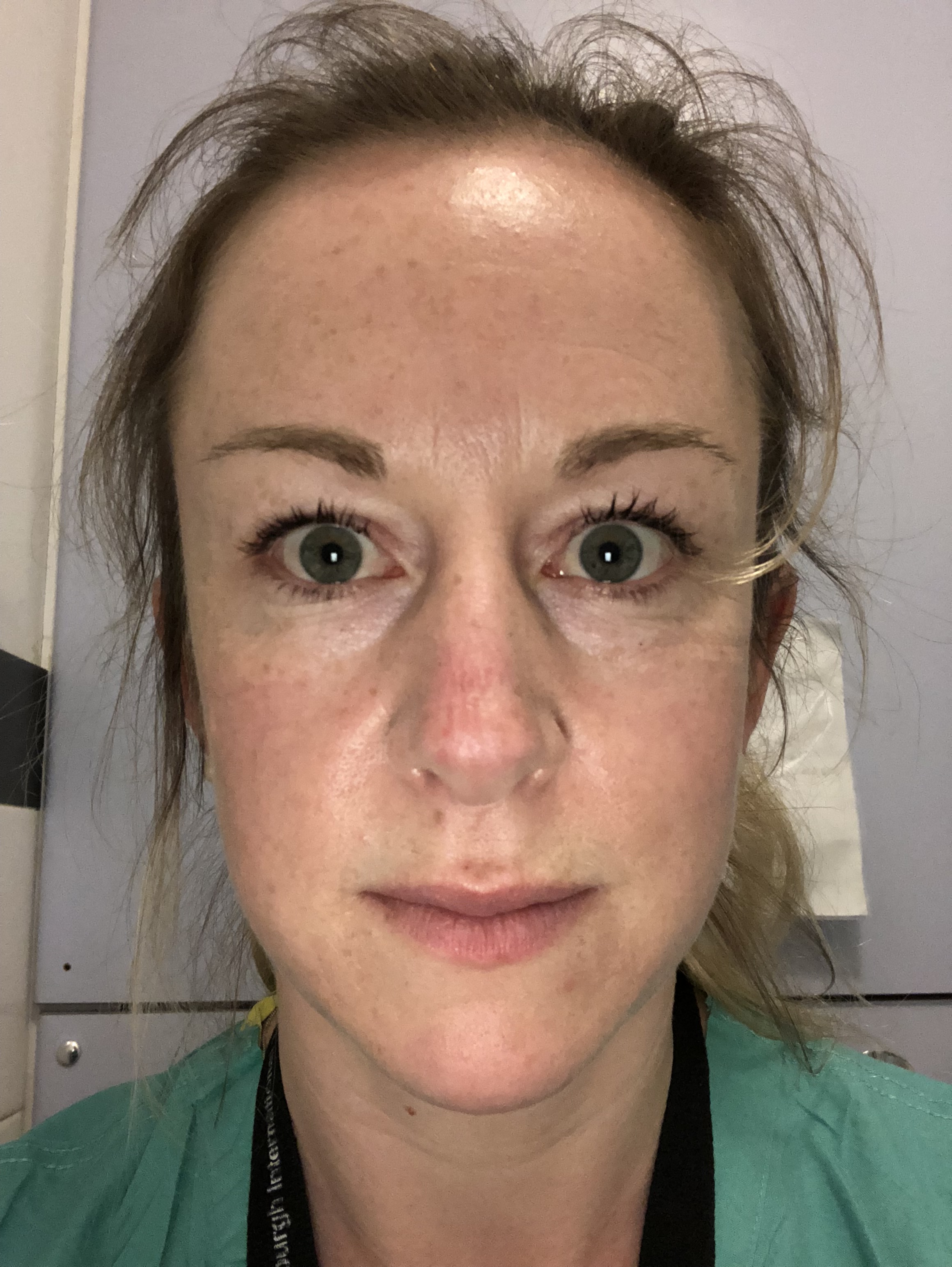 Dr Kate Ella in surgical scrubs